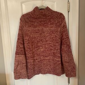 Hand knit turtleneck sweater, fits size large.